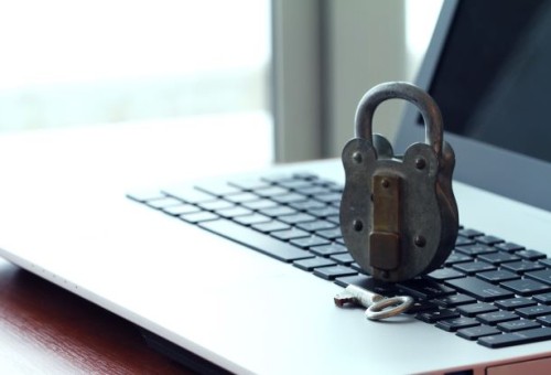 vecteezy_internet-security-concept-old-padlock-and-key-on-laptop__474_web.jpg
